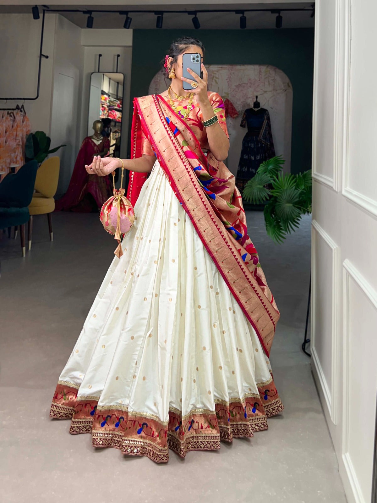 Paithani collection
Who says you can't be trendy and traditional at the same time?
This Jacquard Silk Paithani Lehenga Choli is the perfect