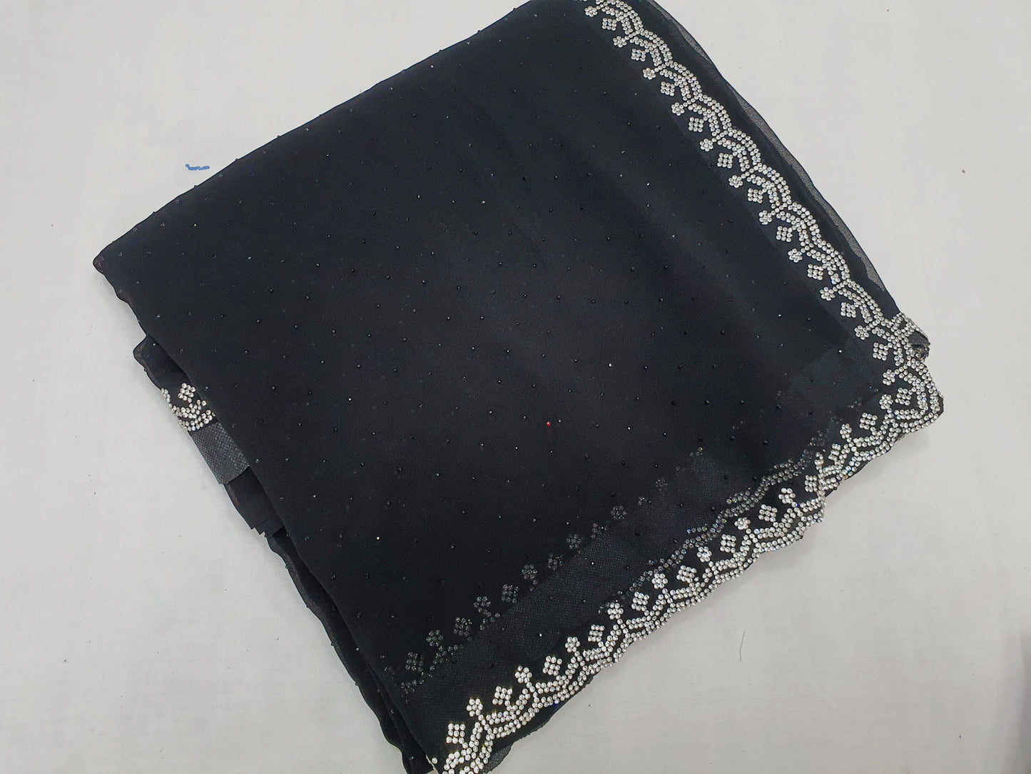 ALLOVER JARKAN STONE BORDER AND SELF SWAROSKI STONE ON GEORGETTE*Saree