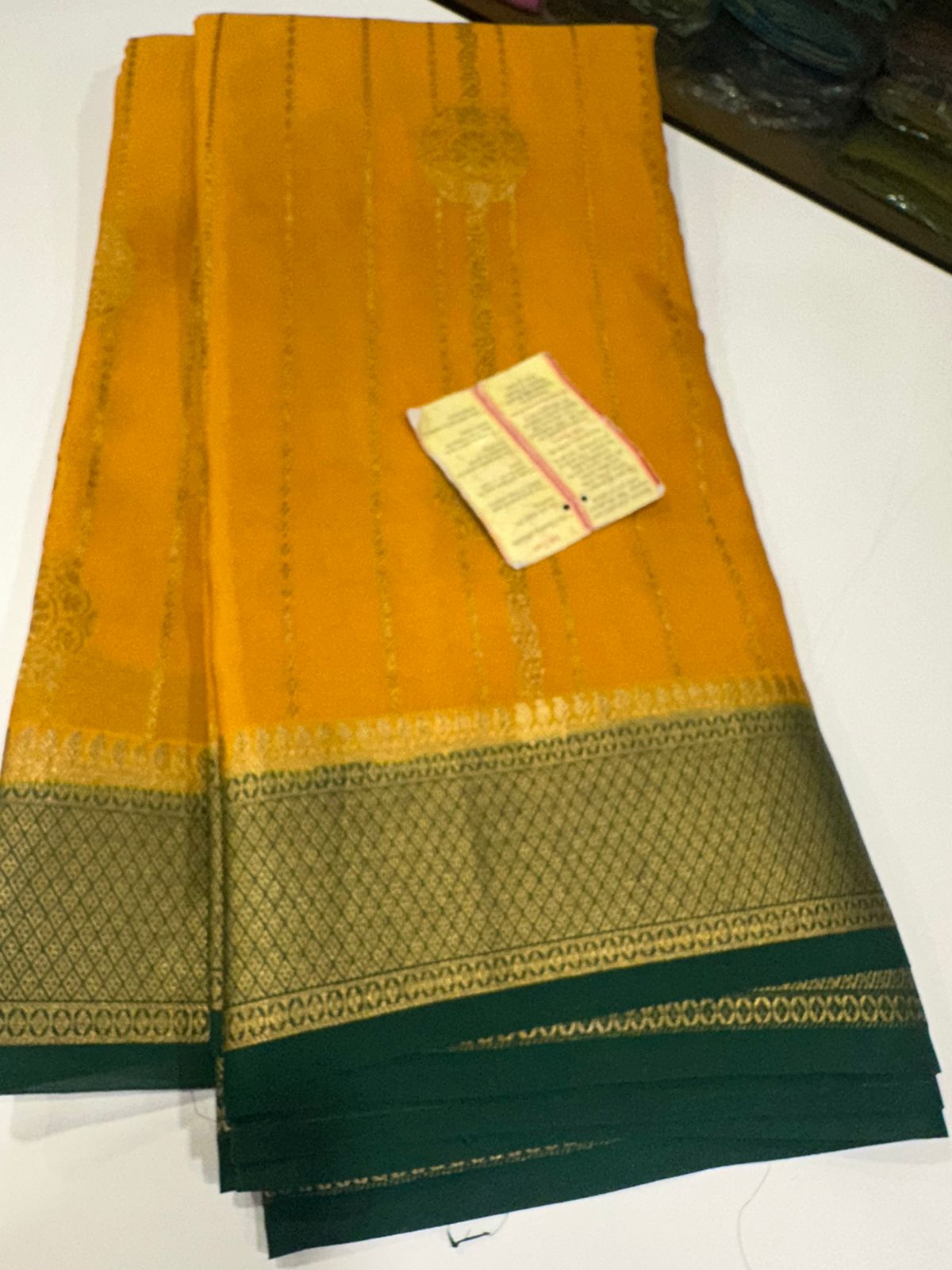 Pure Mysore silk sarees
120 grm thickness with rich pallu
Silk mark certified
Big Bentex border with motifs on the body n vertical lines .....small motifs all over body with rich pallu