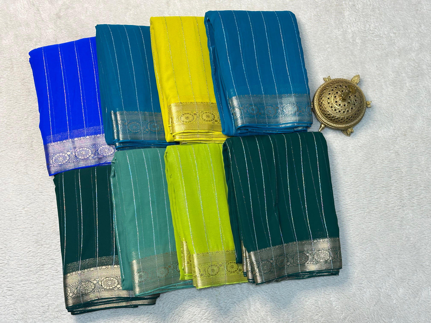 Designer Chiffon Sarees Beautiful Chiffon sarees having Elegant deco vertical stripes with rich pallu in elegant shades
