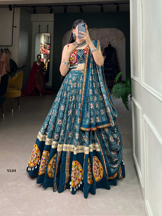 Navratri Chaniya Choli
Lehenga:* Pure Rayon Printed With Foil Work And Gamthi Patch Work With Lace Touch Up
Choli:* Pure Cotton Plain And Gamthi Work With Gota Patti And Cowrie (Kodi) Lace Touch Up