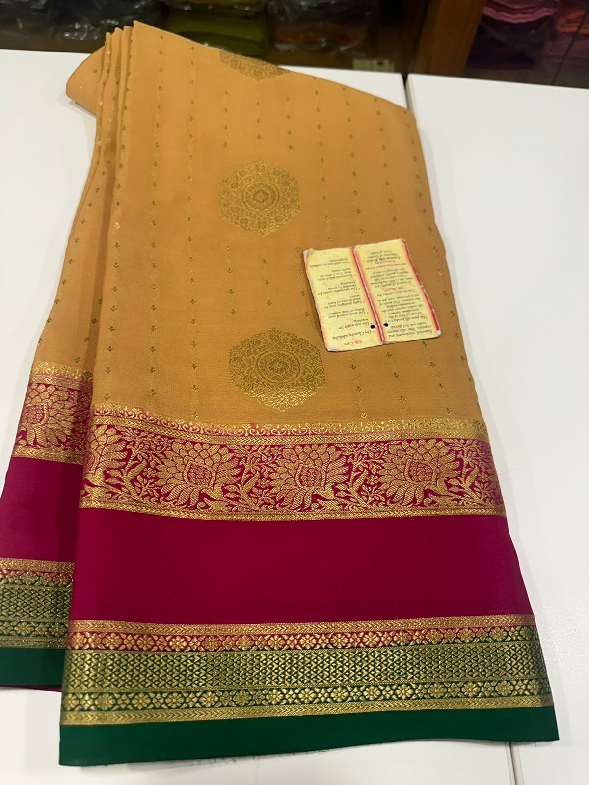 Pure Mysore silk sarees
120 grm thickness  with rich pallu 
Silk mark certified
Big Bentex border with motifs on the body n vertical lines   .....small motifs all over body with rich pallu
