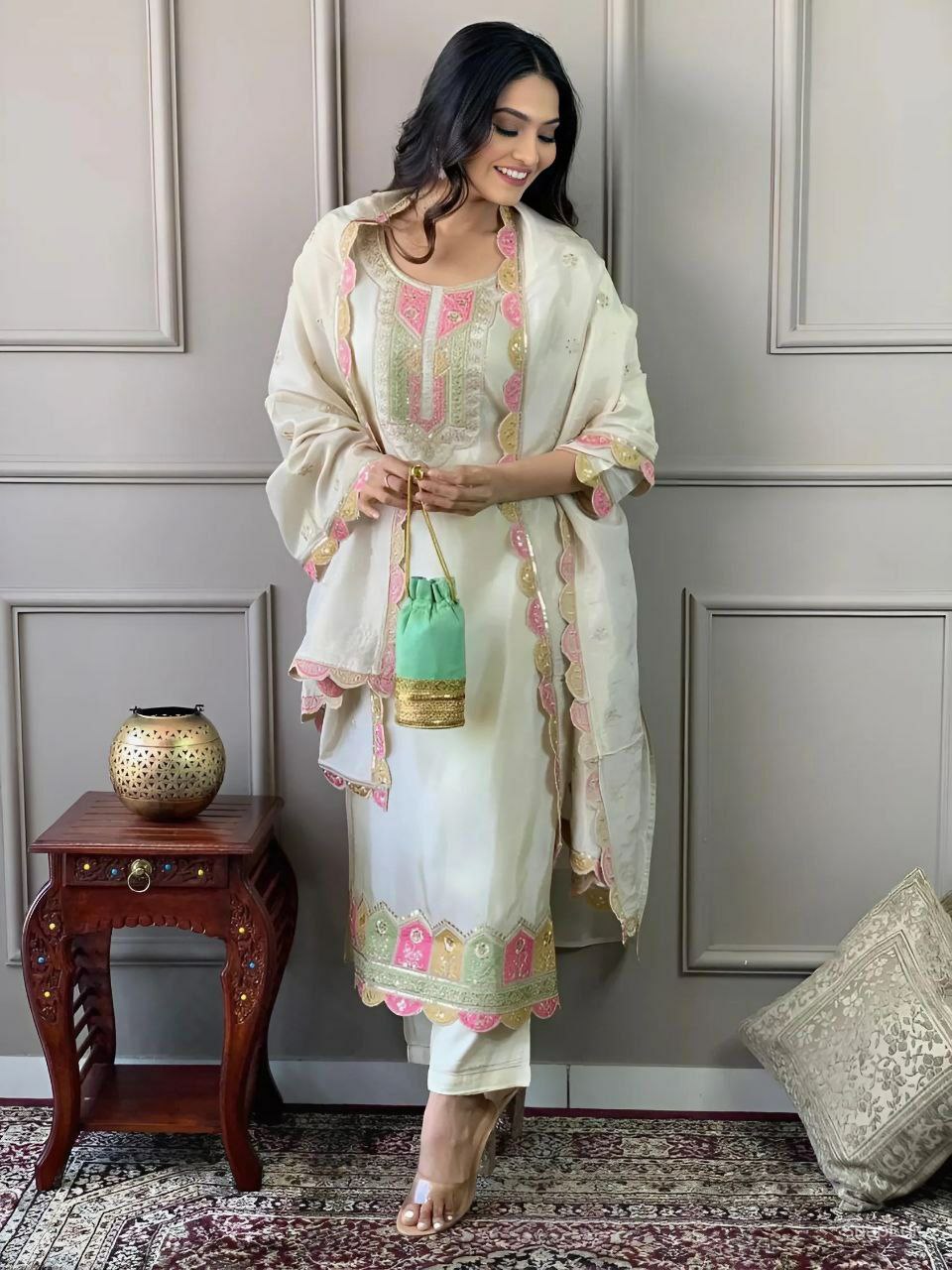Suti set 
TOP FABRIC : VISCOSE CHANDERI WITH SEQUENCE CODING EMBROIDERY WORK