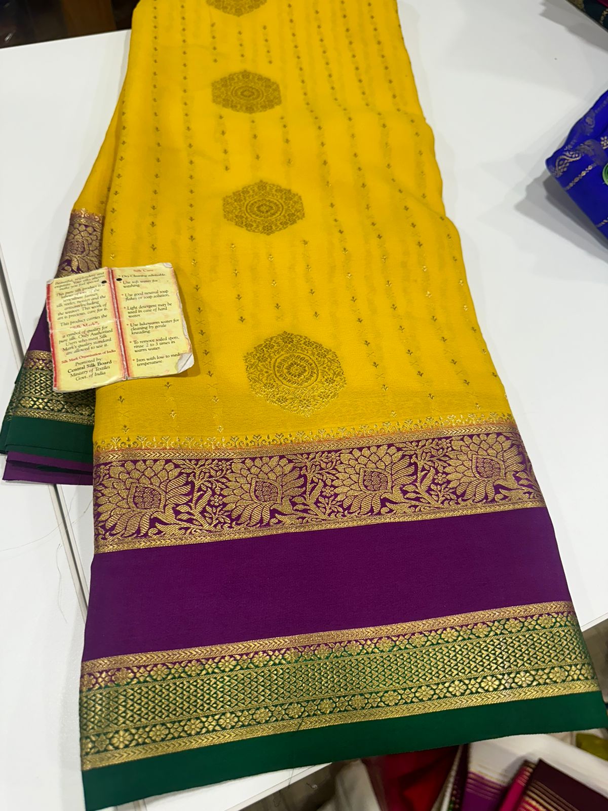 Pure Mysore silk sarees
120 grm thickness  with rich pallu 
Silk mark certified
Big Bentex border with motifs on the body n vertical lines   .....small motifs all over body with rich pallu