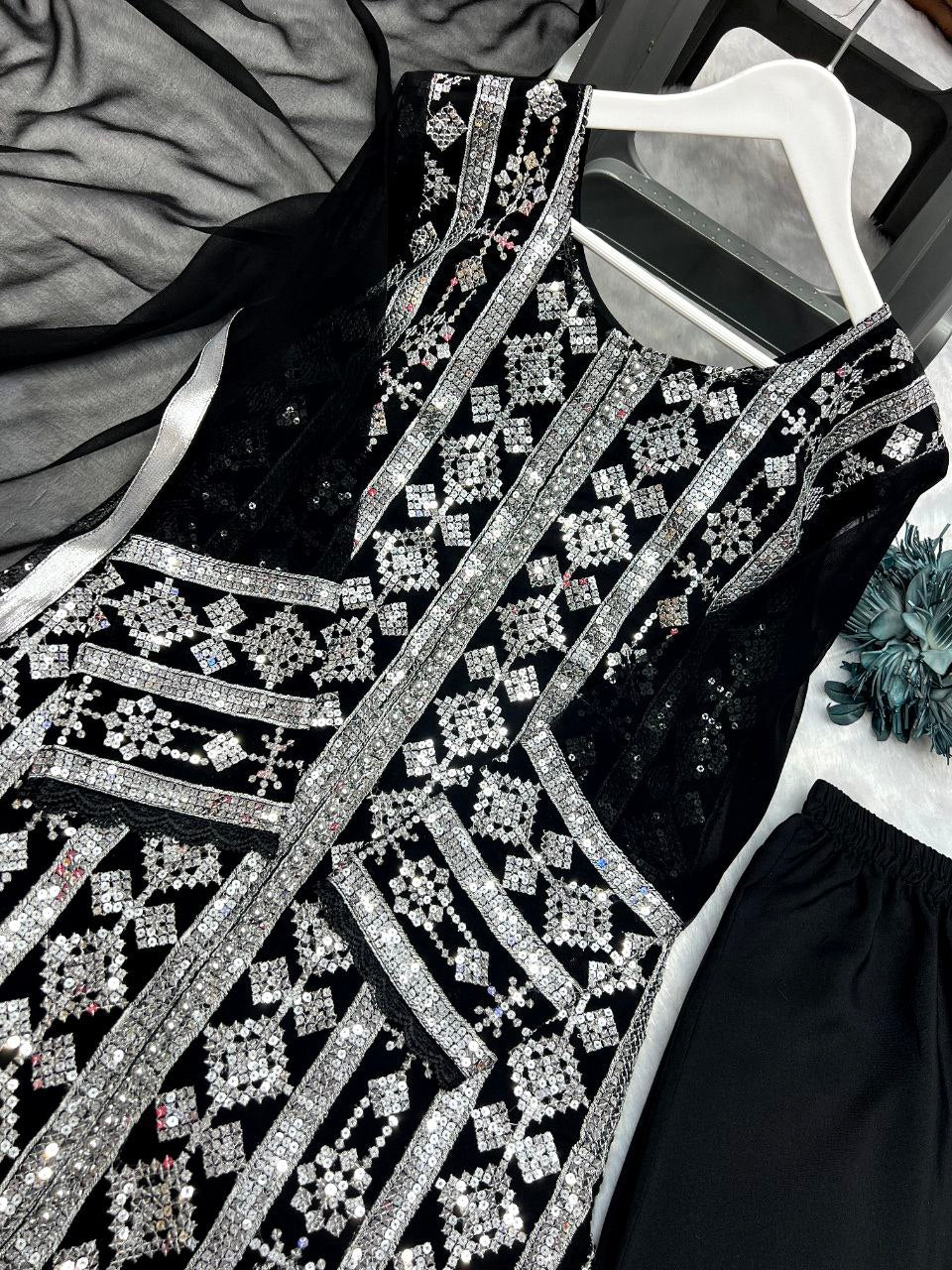 Designer suit set
FABRICE:-Heavy faux georgette 
WORK - Fancy Embroidery 5mmSequence Work with fancy GPO lace border 
SLEEVE :- Full Sleeve With embroidery 5mm sequence Work with fancy GPO lace border 
INNER :- Micro Cotton