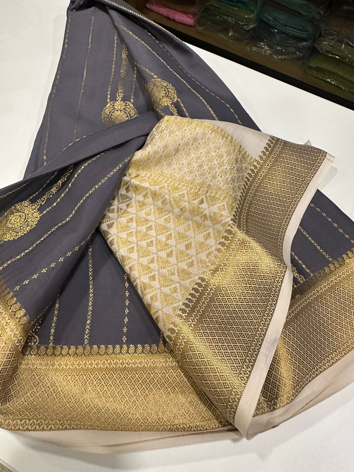 Pure Mysore silk sarees
120 grm thickness  with rich pallu 
Silk mark certified
Big Bentex border with motifs on the body n vertical lines   .....small motifs all over body with rich pallu