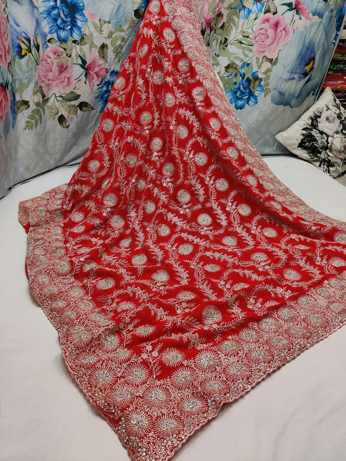 Allover silver jari jall with jarkan stone border on Georgtee 
Saree