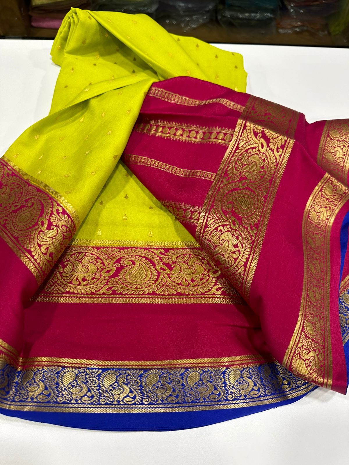 Pure Mysore silk sarees
120 grm thickness  with rich pallu 
Silk mark certified
Big mango n peacock design on border
