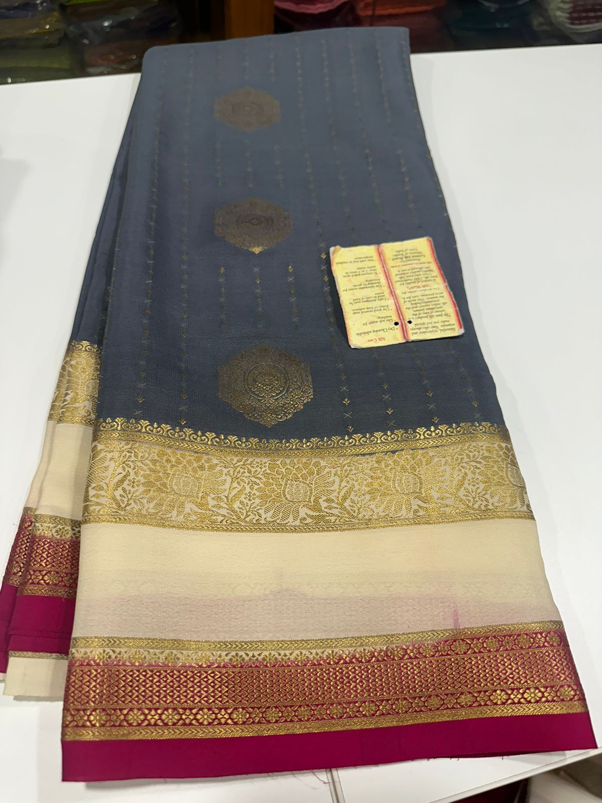 Pure Mysore silk sarees
120 grm thickness  with rich pallu 
Silk mark certified
Big Bentex border with motifs on the body n vertical lines   .....small motifs all over body with rich pallu