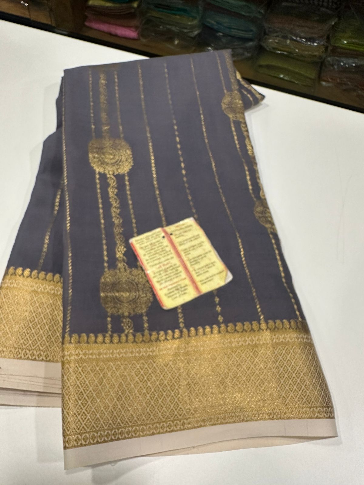 Pure Mysore silk sarees
120 grm thickness  with rich pallu 
Silk mark certified
Big Bentex border with motifs on the body n vertical lines   .....small motifs all over body with rich pallu