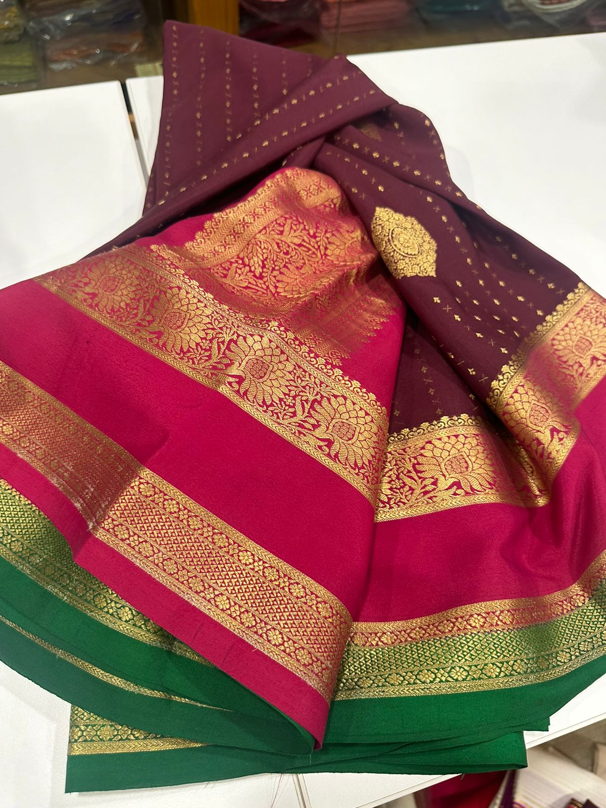 Pure Mysore silk sarees
120 grm thickness  with rich pallu 
Silk mark certified
Big Bentex border with motifs on the body n vertical lines   .....small motifs all over body with rich pallu