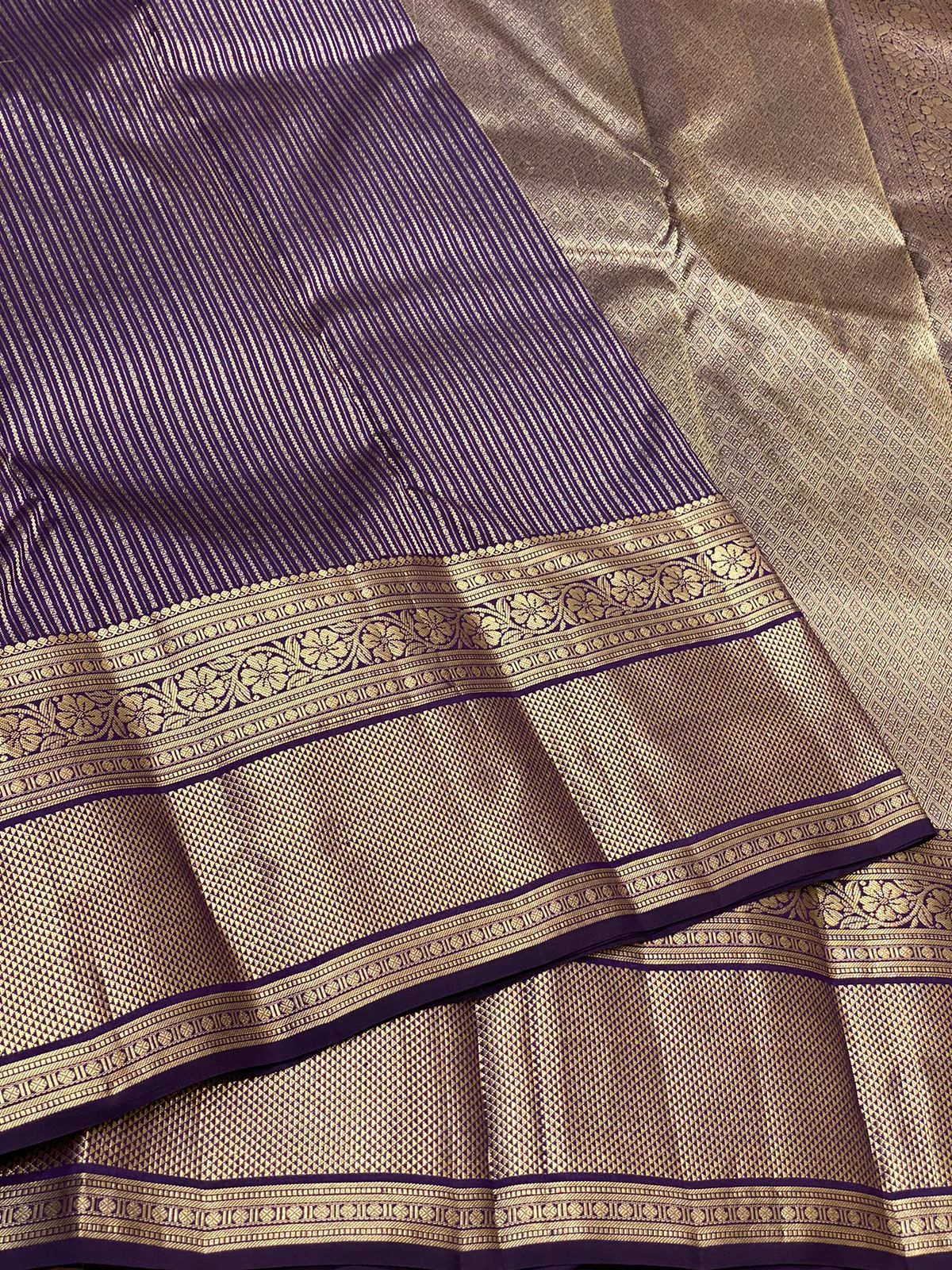 Pure Kanchivaram handloom silk saree with pure 2g zari traditional long border strip butta all over saree 
Silkmark certified