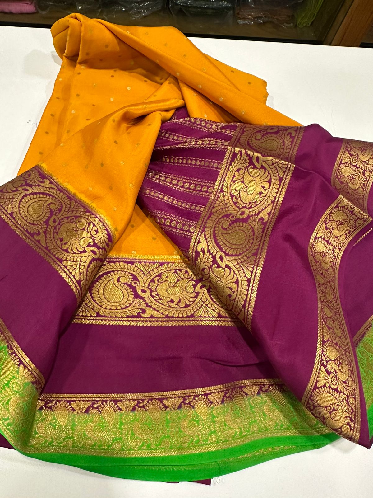 Pure Mysore silk sarees
120 grm thickness  with rich pallu 
Silk mark certified
Big mango n peacock design on border