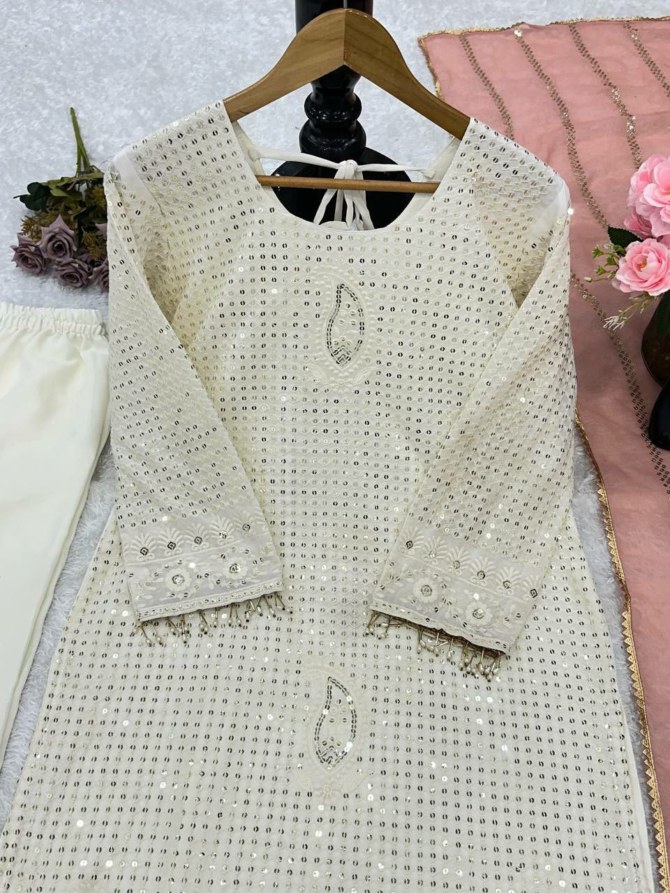 Beautiful suits said perfect additional look
TOP FABRIC : HAVY FOUX GOARGATYE WITH HAVY EMBROIDERY WORK AND MOTI LACE WORK