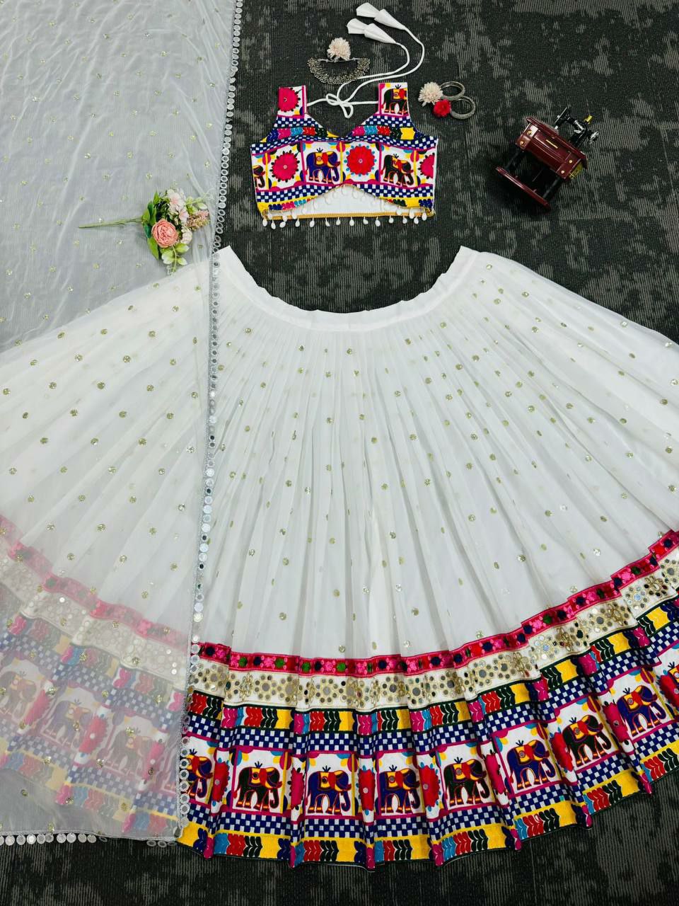 Perfect ring ceremony lehenga choli set :                                   Foux gorgette 
Work : Sequnce with Chainstich work with *Real mirror