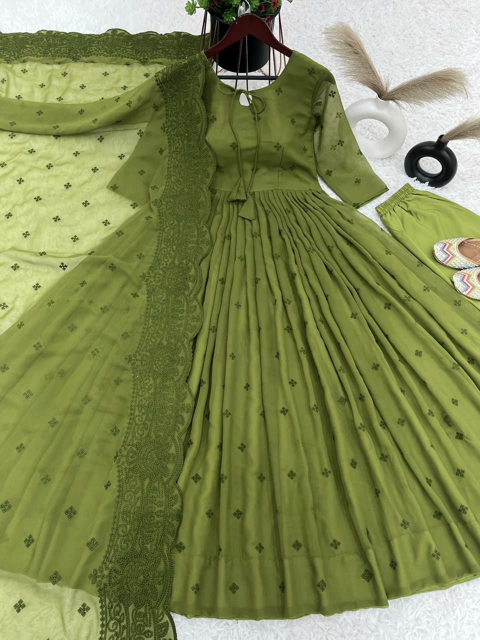 Designer suit set heavy Faux Georgette With Embroidery Work With Fancy Full Sleeve
Top Inner : Heavy Micro Cotton
Top Length:-48-49Inch
Top Size:
 M(38),L(40),Xl(42),XXL(44)
(FULLY STITCHED READY TO WEAR)