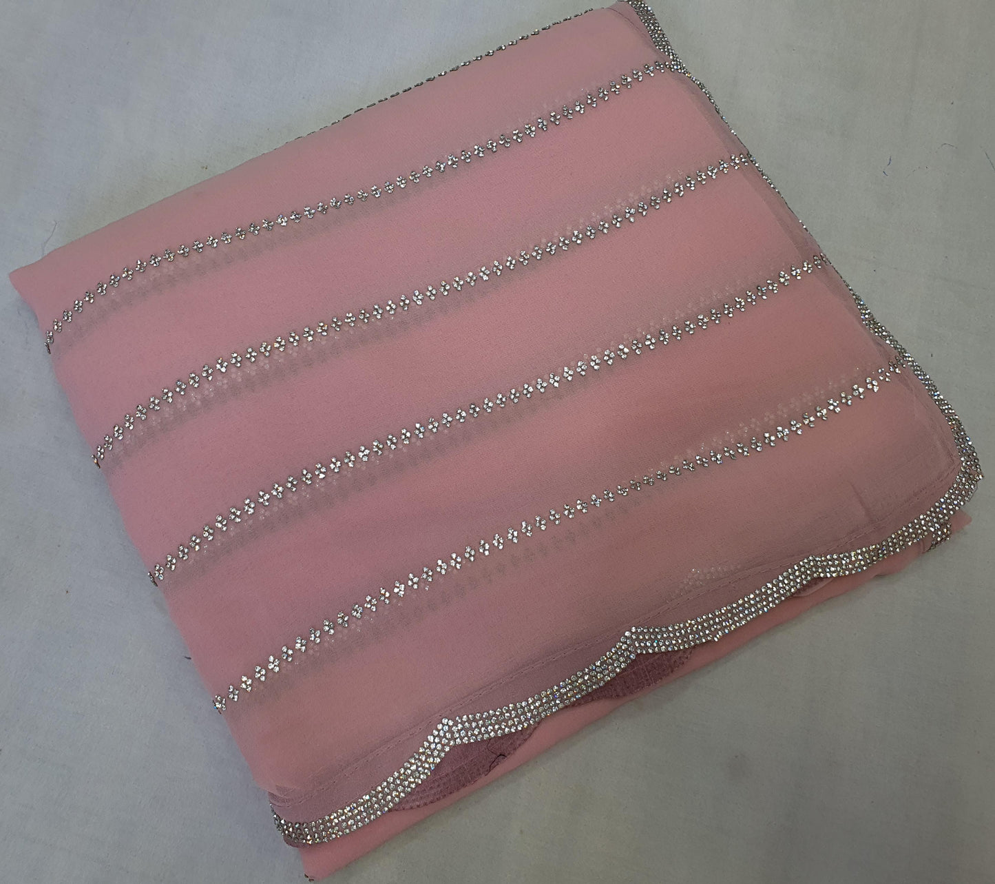 ALLOVER JARKAN STONE WORK AND BORDER ON PURE GEORGETTE*saree