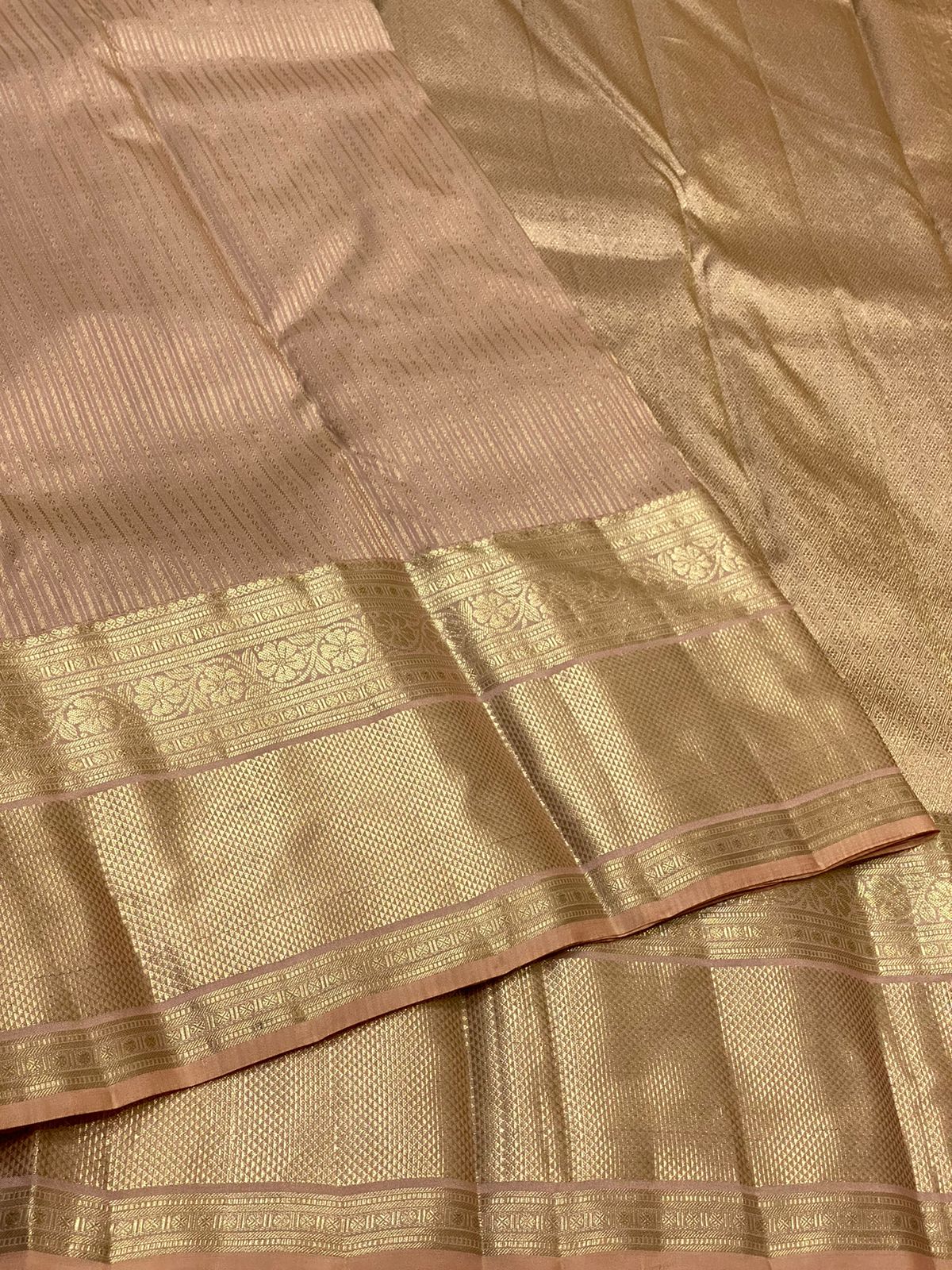 Pure Kanchivaram handloom silk saree with pure 2g zari traditional long border strip butta all over saree 
Silkmark certified