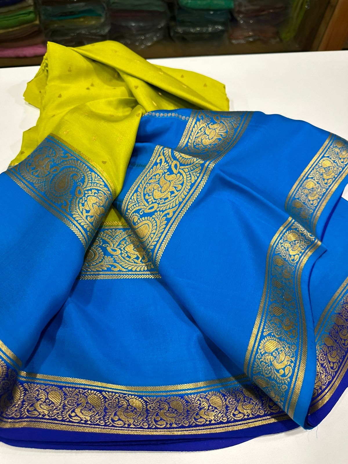 Pure Mysore silk sarees
120 grm thickness  with rich pallu 
Silk mark certified
Big mango n peacock design on border