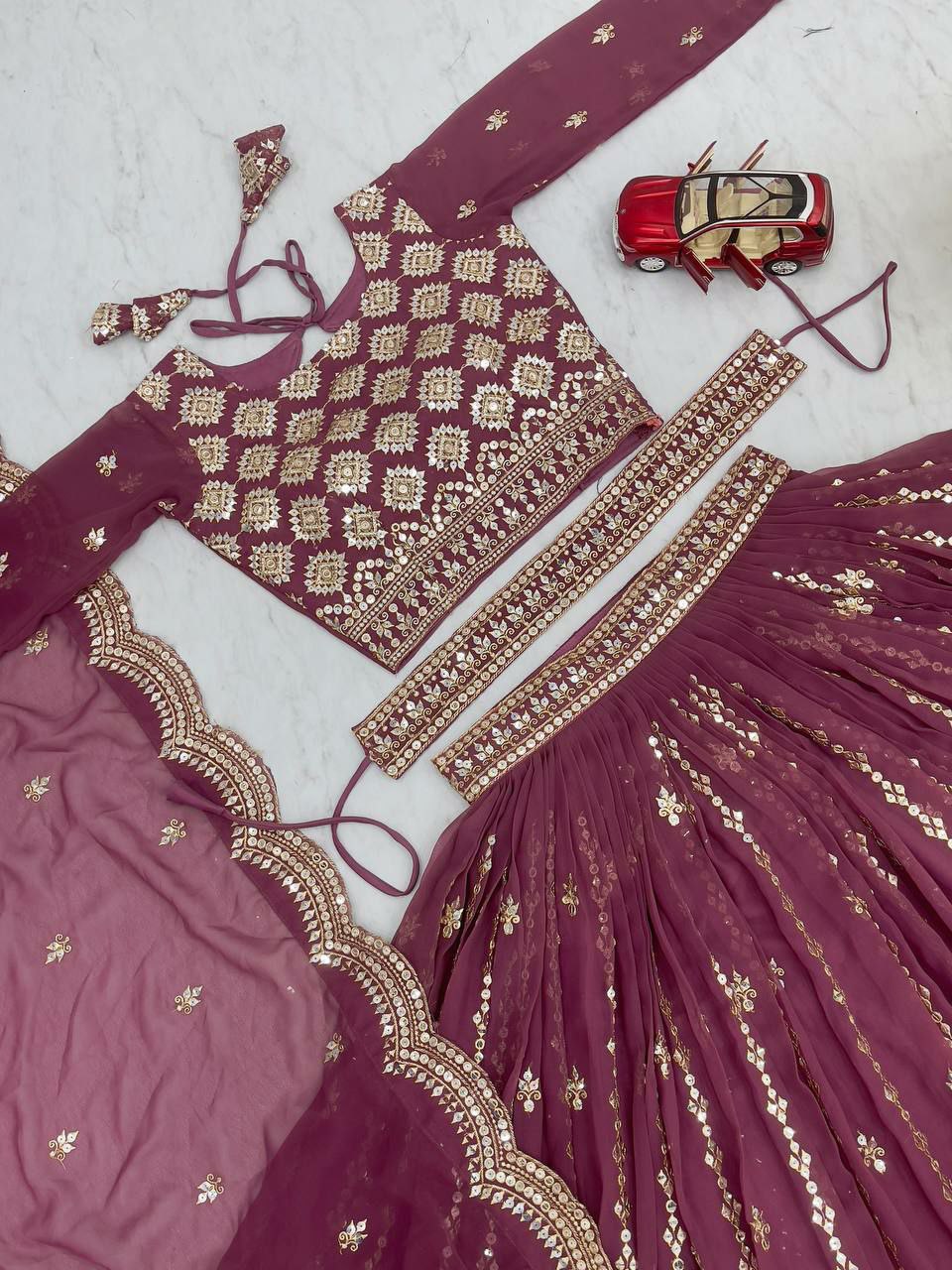 Perfect functions Lengha Choli
Fabric: Fox Georgette 
Work:-Heavy 7mm Sequence Work
