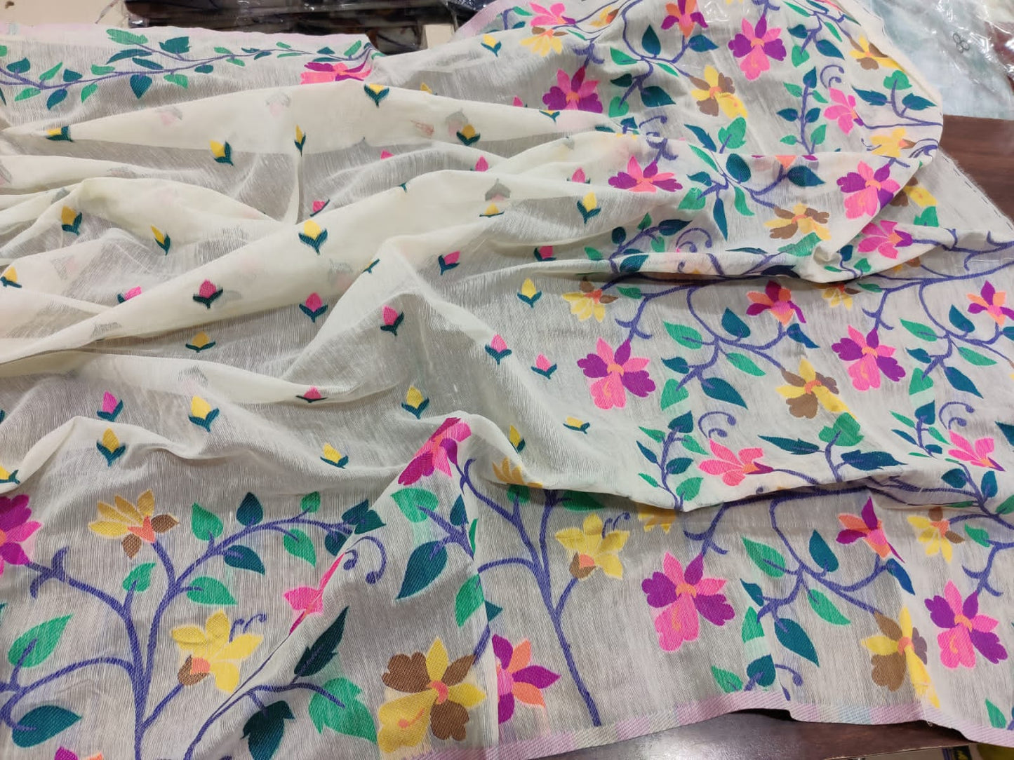 Tantuja slub cotton sarees with all over* *madhobilata weaves*