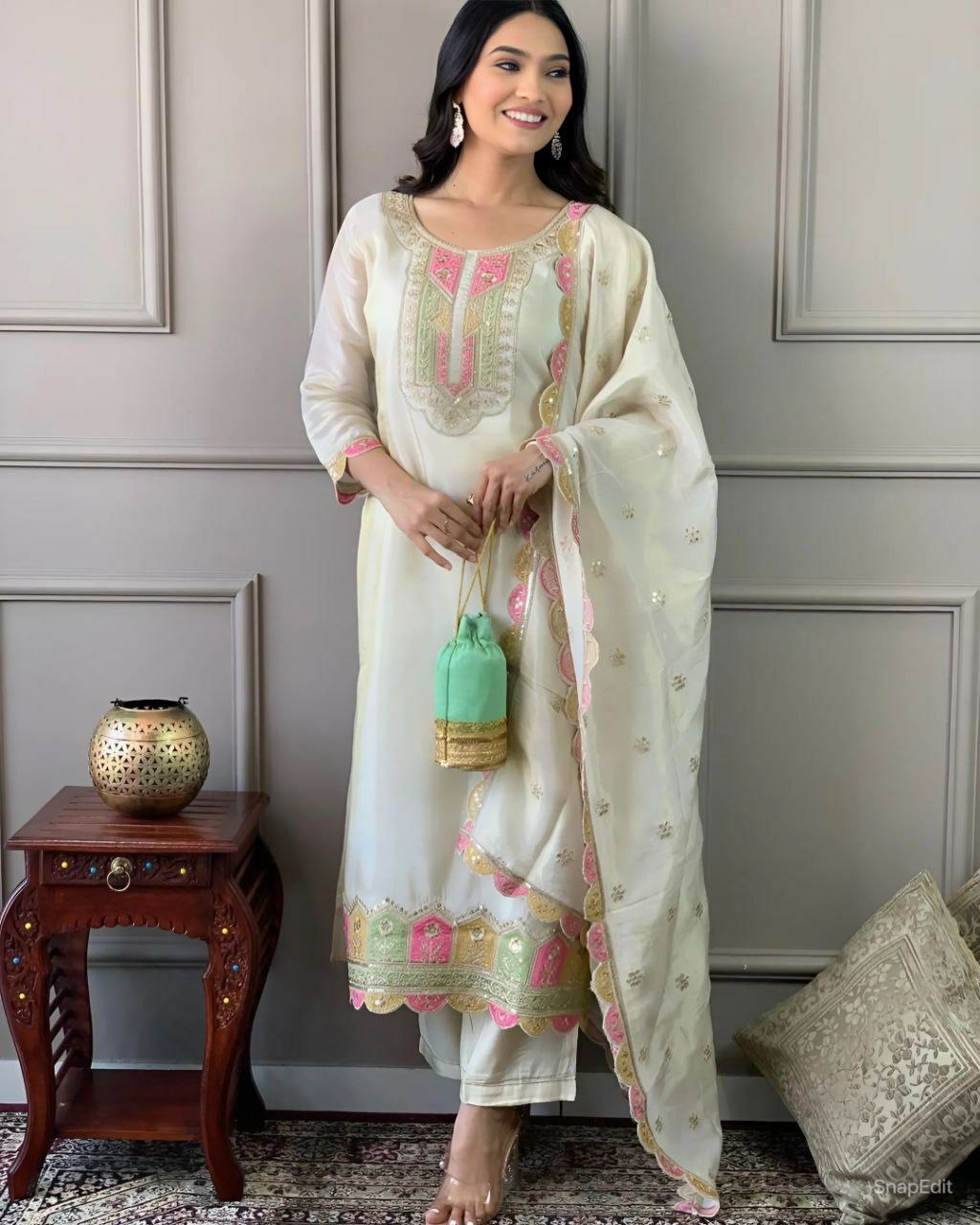 Suti set 
TOP FABRIC : VISCOSE CHANDERI WITH SEQUENCE CODING EMBROIDERY WORK