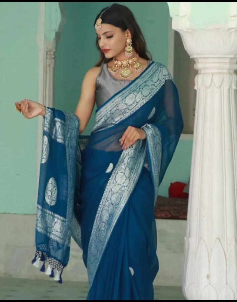 New Banarasi Semi Georgette Sarees
With Silver Zari Buta Good Quality
Banarasi blouse