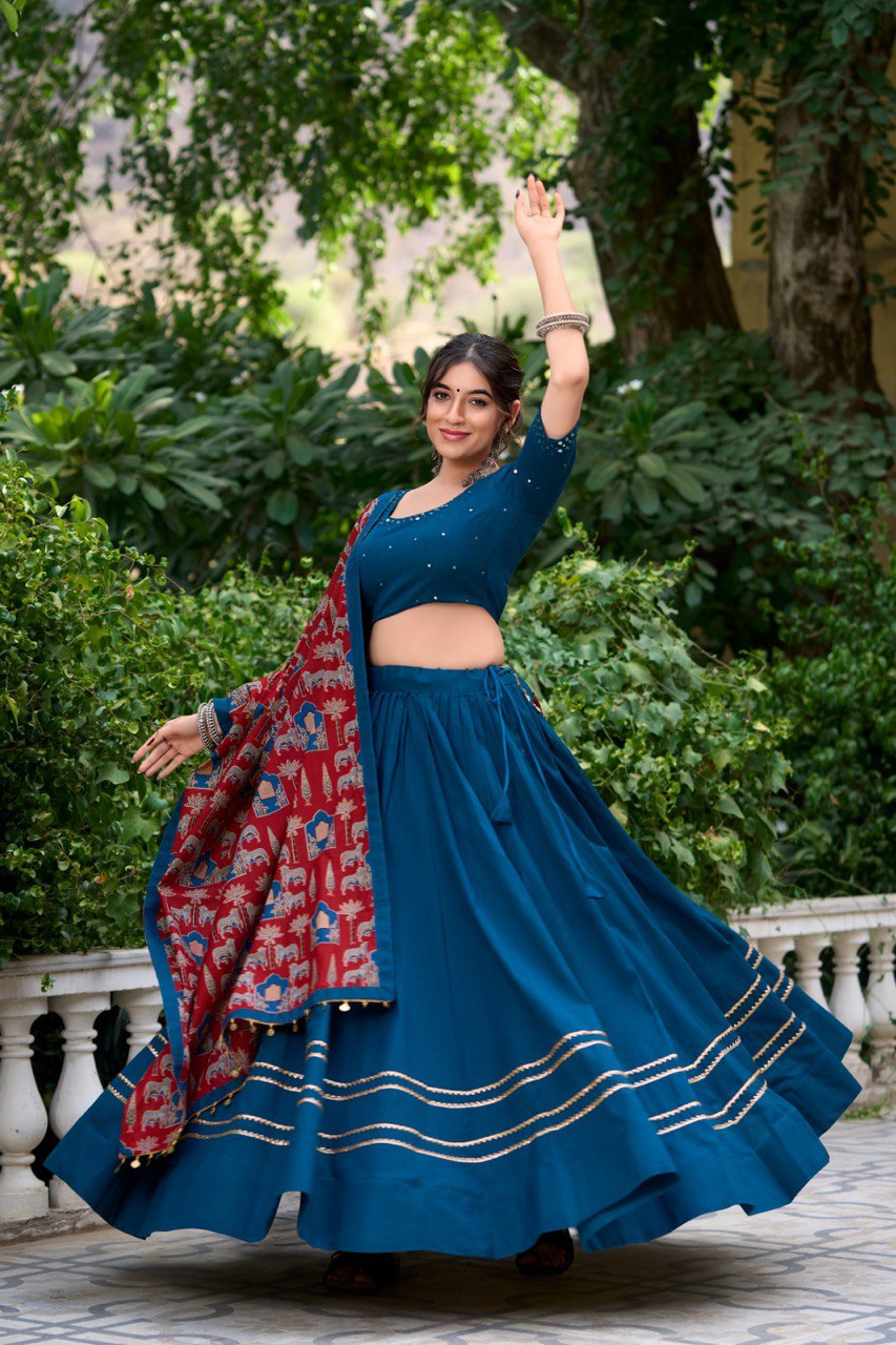 Dance through Navratri nights in this beautifully printed pure cotton lehenga choli