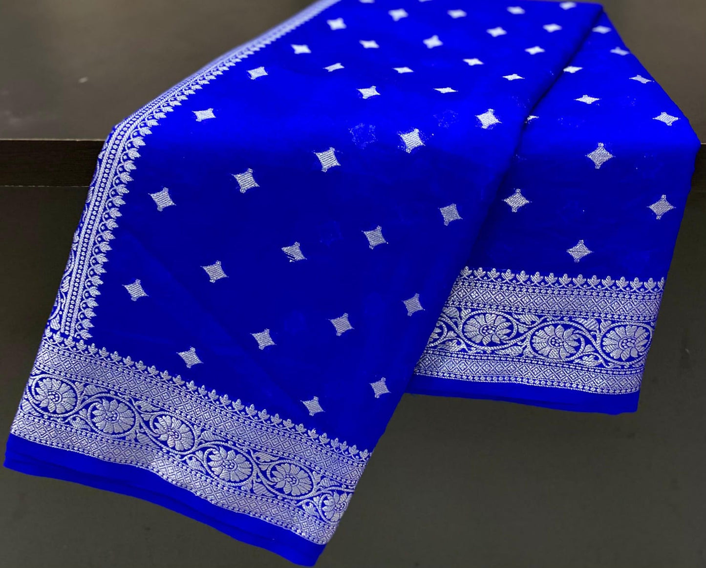 Banarsi Handloom Semi  Georgette Sarees With All Over Zari Weaving Tara Buti 
With Beautiful Designer Border Designer Rich Pallu With Plain Blouse One Side Border