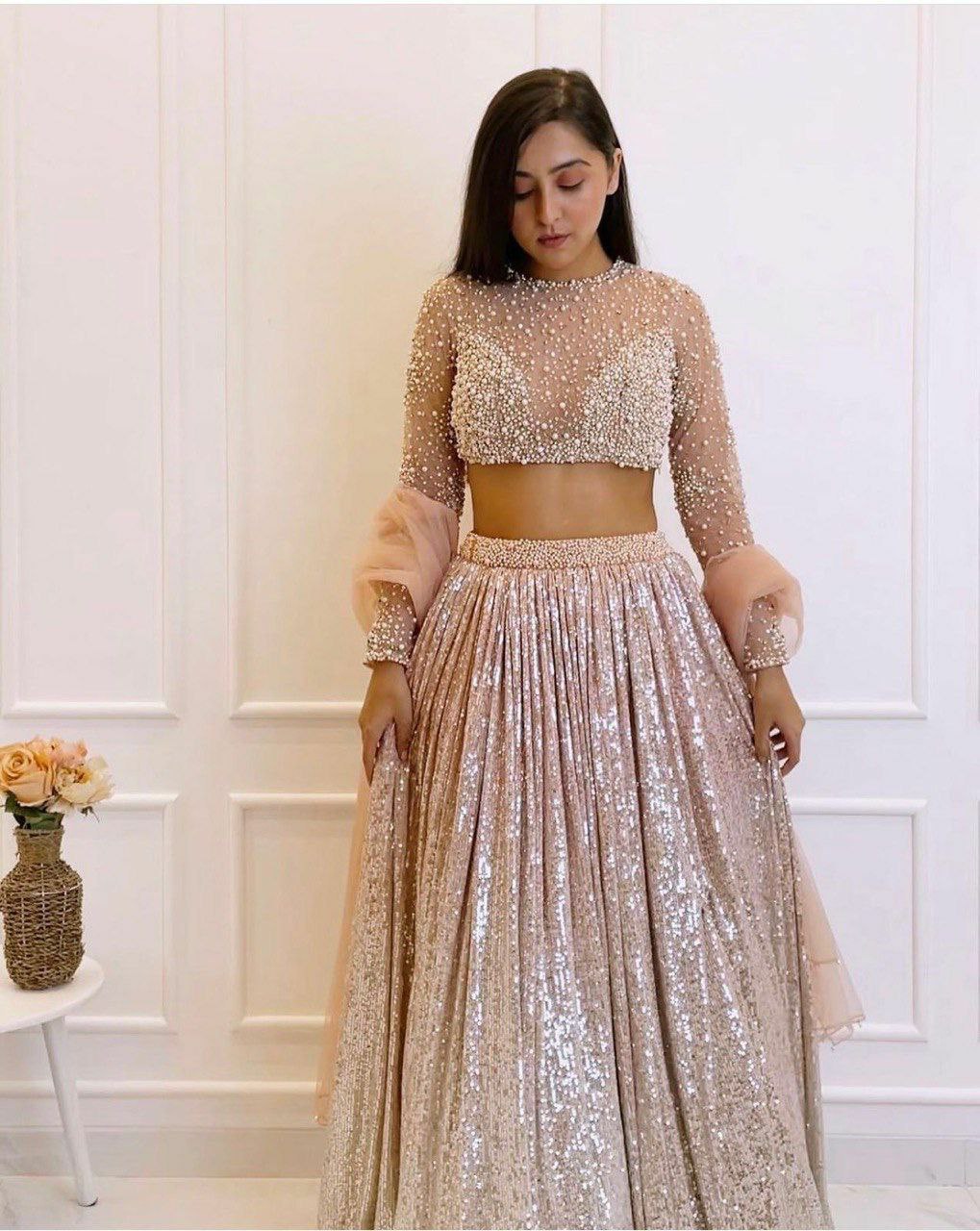 Party wear lehenga collection satin silk padding lehnga with sequence work 
Flair 3 meter
Can can attach
 Net blouse with Pearl , sequnece & zari work all over front & back ( Unstich )
Net Duppata with Pearl border work