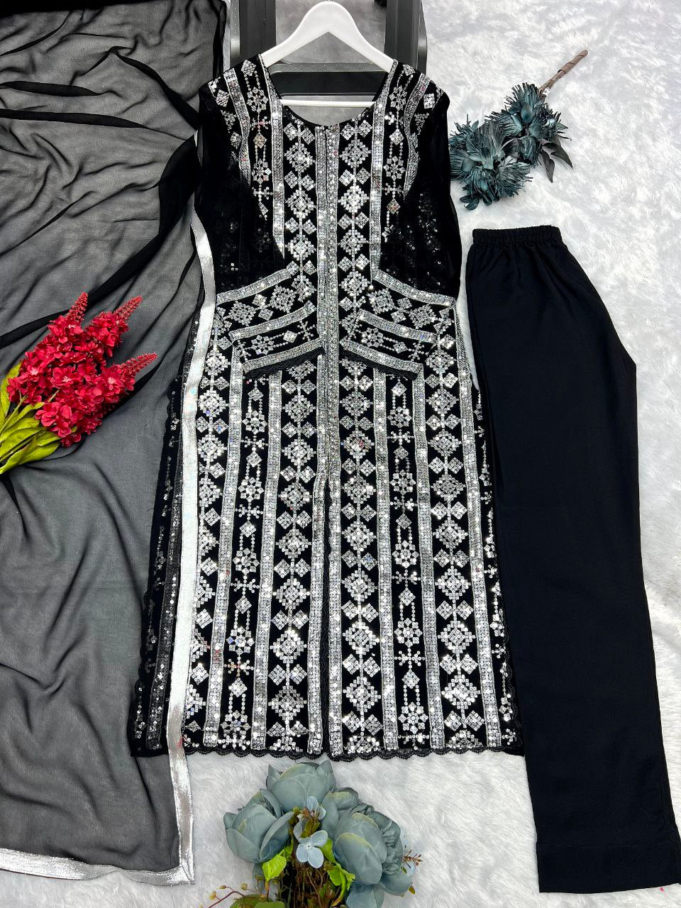 Designer suit set
FABRICE:-Heavy faux georgette 
WORK - Fancy Embroidery 5mmSequence Work with fancy GPO lace border 
SLEEVE :- Full Sleeve With embroidery 5mm sequence Work with fancy GPO lace border 
INNER :- Micro Cotton