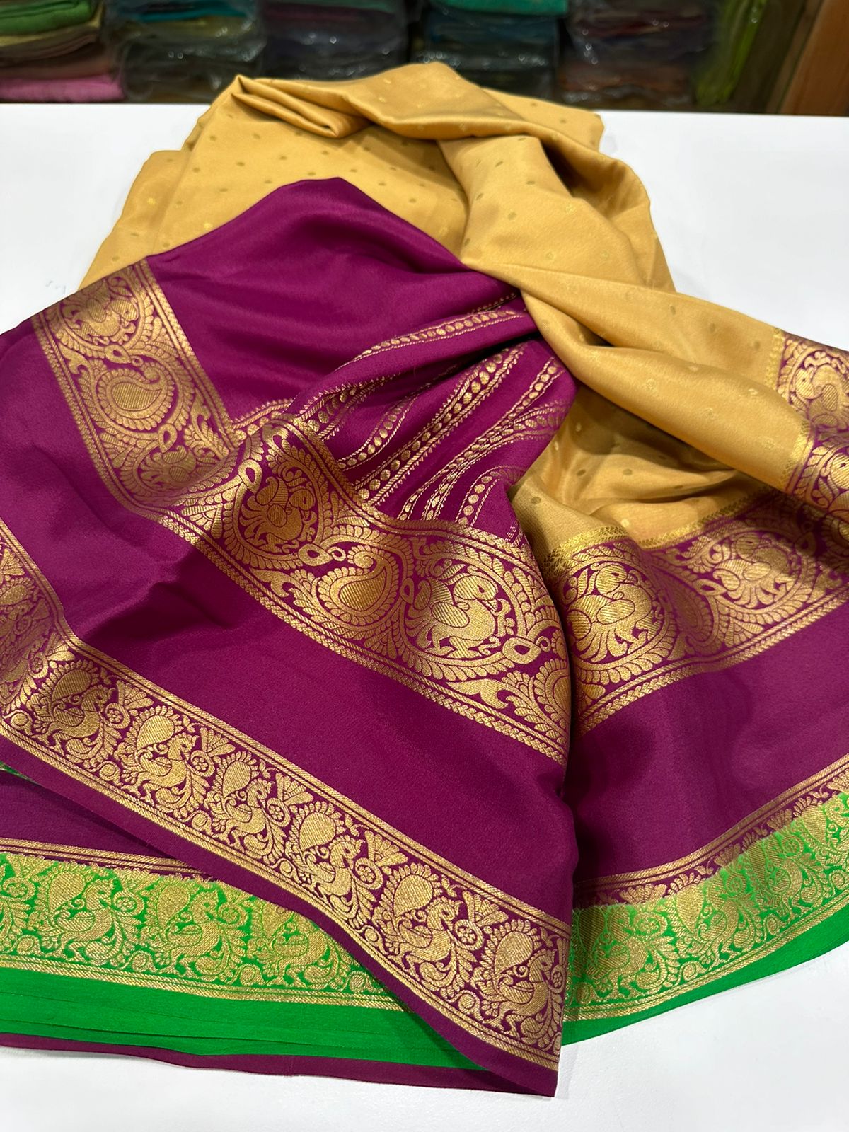 Pure Mysore silk sarees
120 grm thickness  with rich pallu 
Silk mark certified
Big mango n peacock design on border