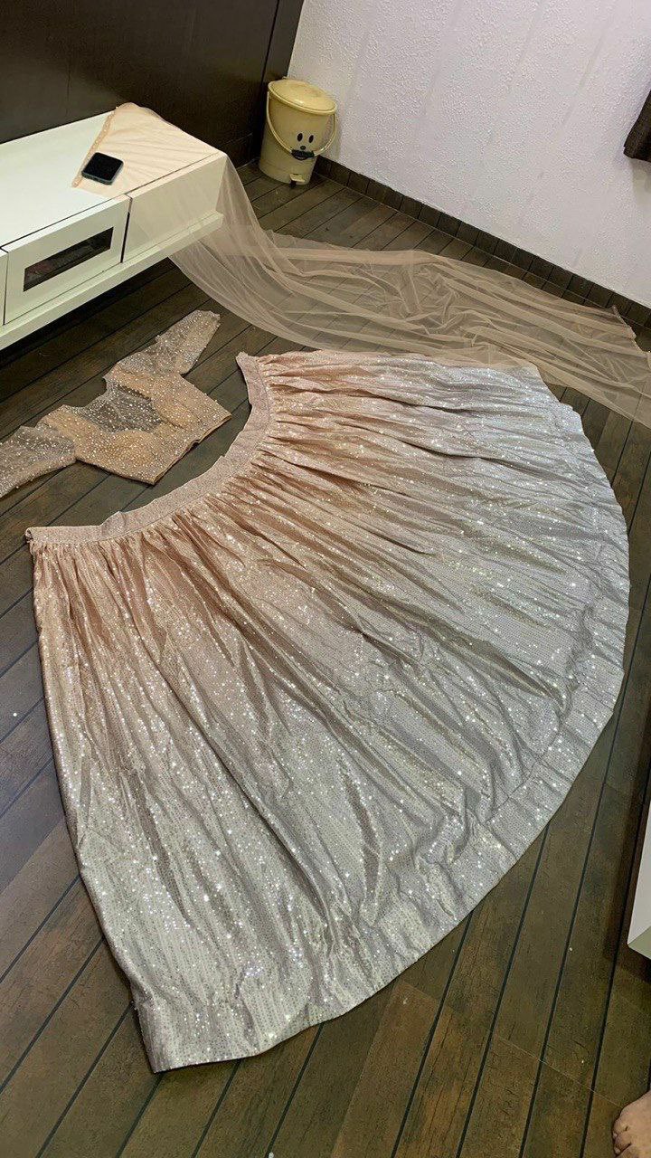 Party wear lehenga collection satin silk padding lehnga with sequence work 
Flair 3 meter
Can can attach
 Net blouse with Pearl , sequnece & zari work all over front & back ( Unstich )
Net Duppata with Pearl border work