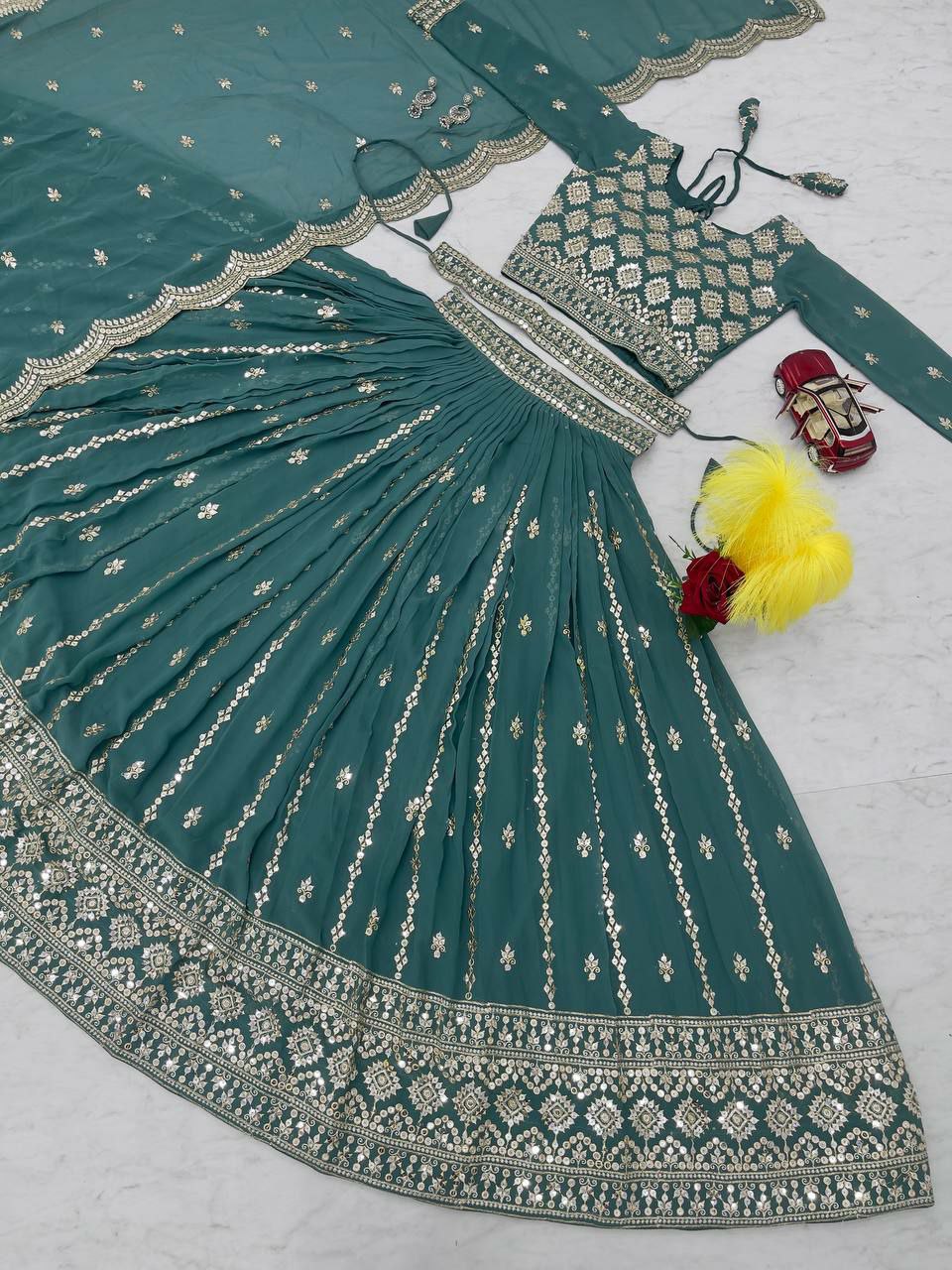 Perfect functions Lengha Choli
Fabric: Fox Georgette 
Work:-Heavy 7mm Sequence Work