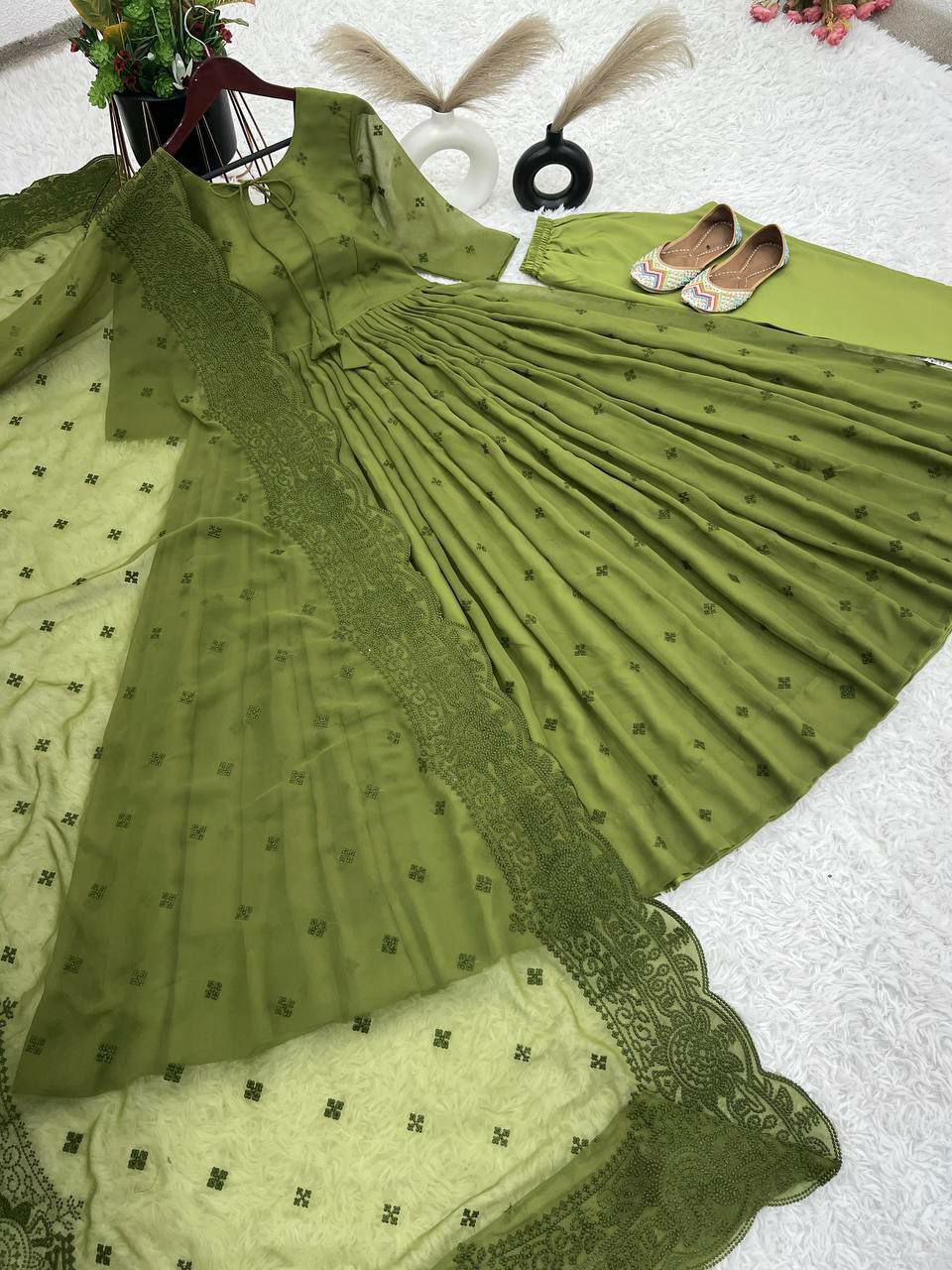 Designer suit set heavy Faux Georgette With Embroidery Work With Fancy Full Sleeve
Top Inner : Heavy Micro Cotton
Top Length:-48-49Inch
Top Size:
 M(38),L(40),Xl(42),XXL(44)
(FULLY STITCHED READY TO WEAR)