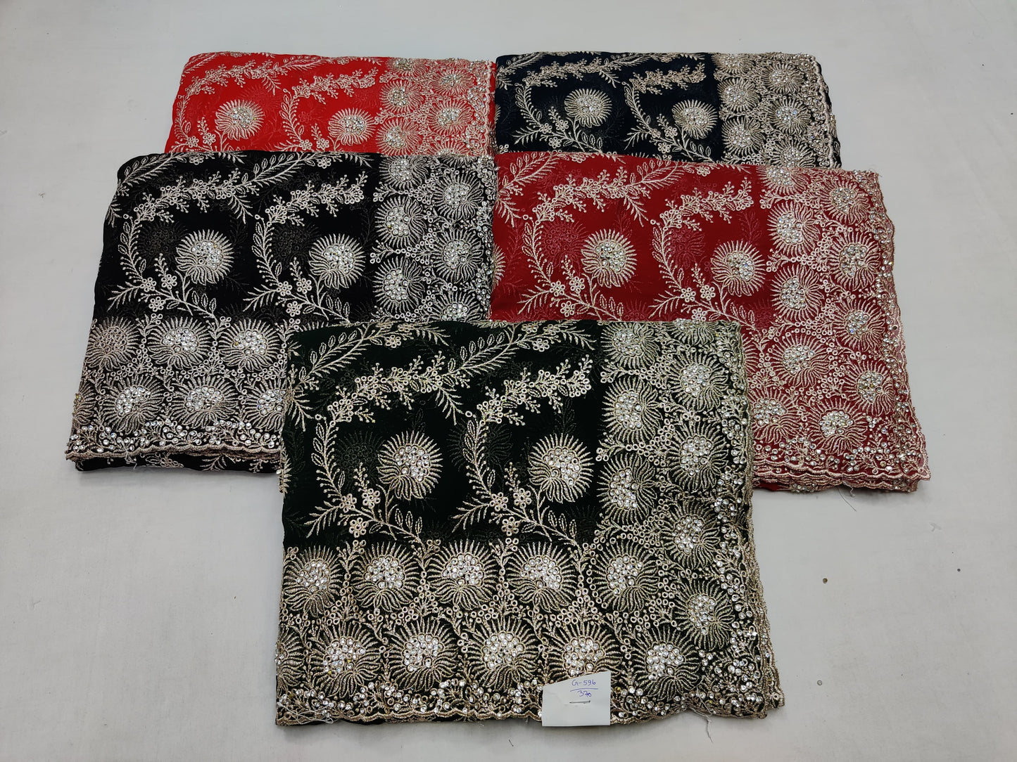 Allover silver jari jall with jarkan stone border on Georgtee 
Saree
