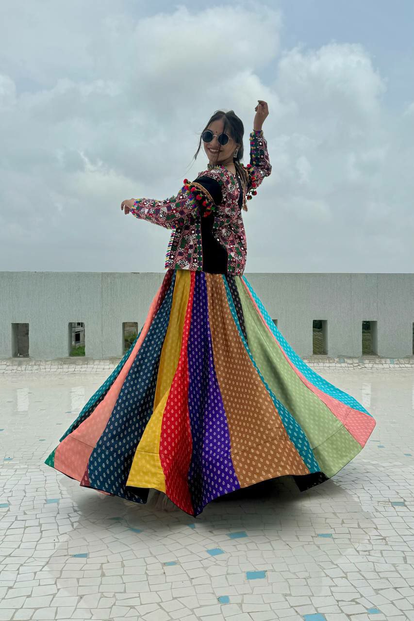 Multi colour lehenga choli with jacket
Koti
Koti Fabric : Heavy Mono Silk
Koti Work : Fancy Gamthi Embroidery With Real Mirror Work And Multiple Fancy Lace Work