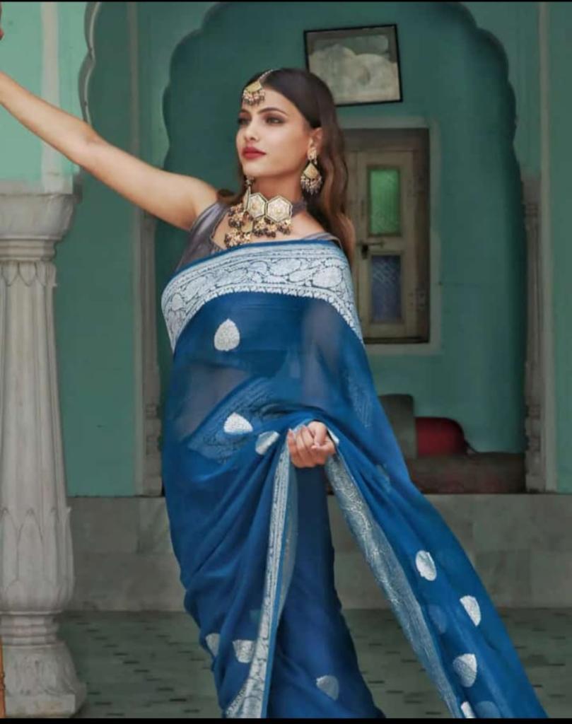 New Banarasi Semi Georgette Sarees
With Silver Zari Buta Good Quality
Banarasi blouse