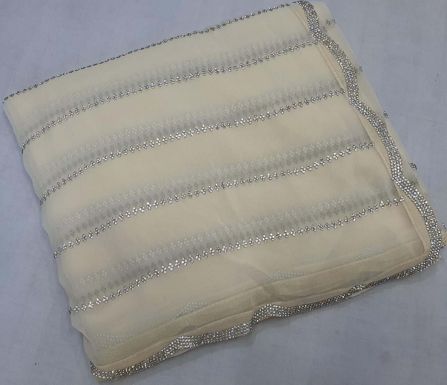 ALLOVER JARKAN STONE WORK AND BORDER ON PURE GEORGETTE*saree