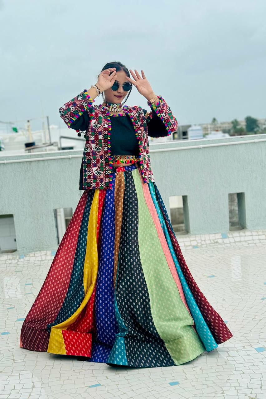 Multi colour lehenga choli with jacket
Koti
Koti Fabric : Heavy Mono Silk
Koti Work : Fancy Gamthi Embroidery With Real Mirror Work And Multiple Fancy Lace Work