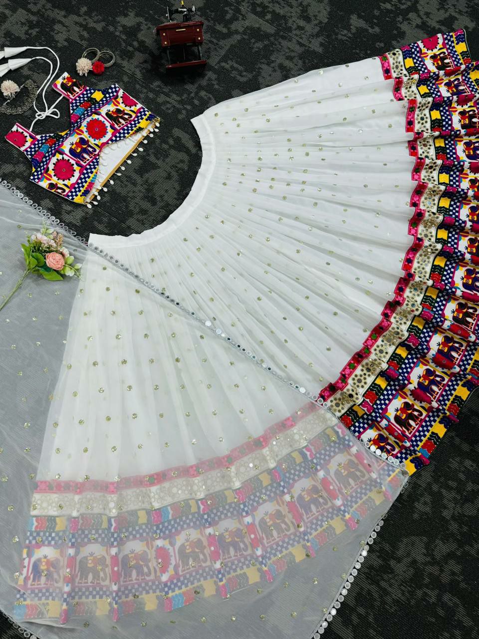 Perfect ring ceremony lehenga choli set :                                   Foux gorgette 
Work : Sequnce with Chainstich work with *Real mirror