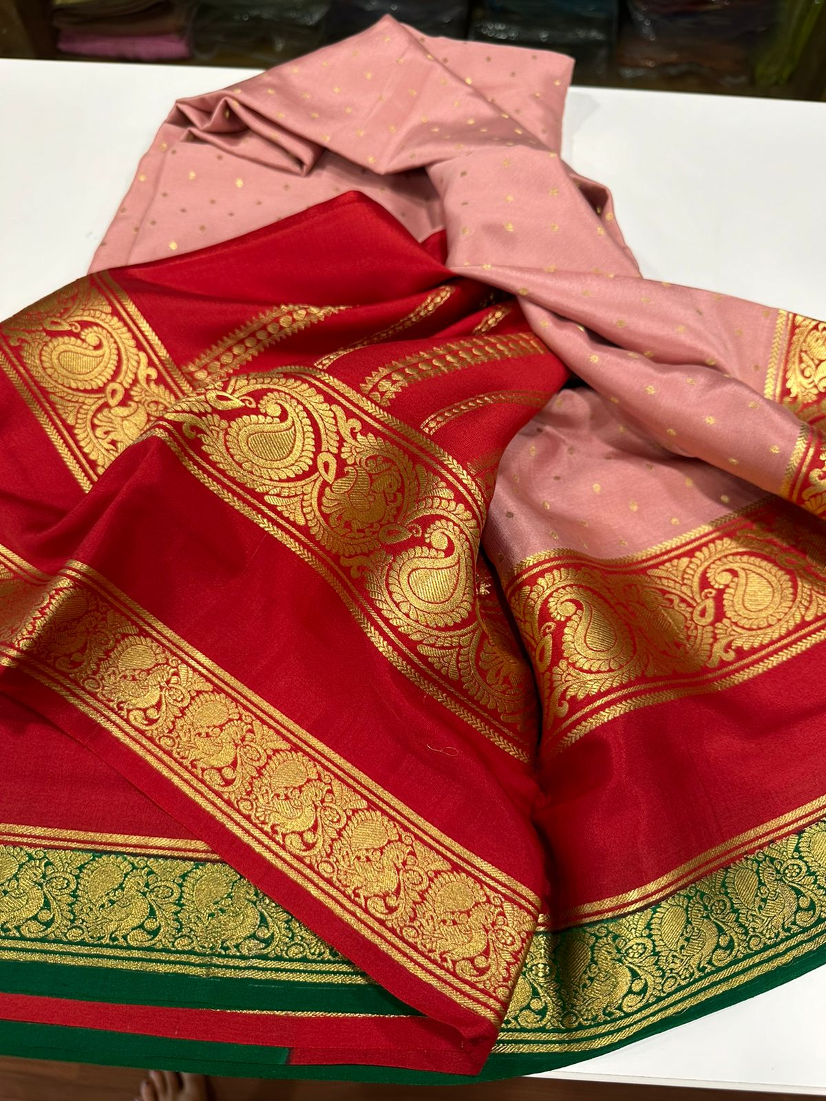 Pure Mysore silk sarees
120 grm thickness  with rich pallu 
Silk mark certified
Big mango n peacock design on border