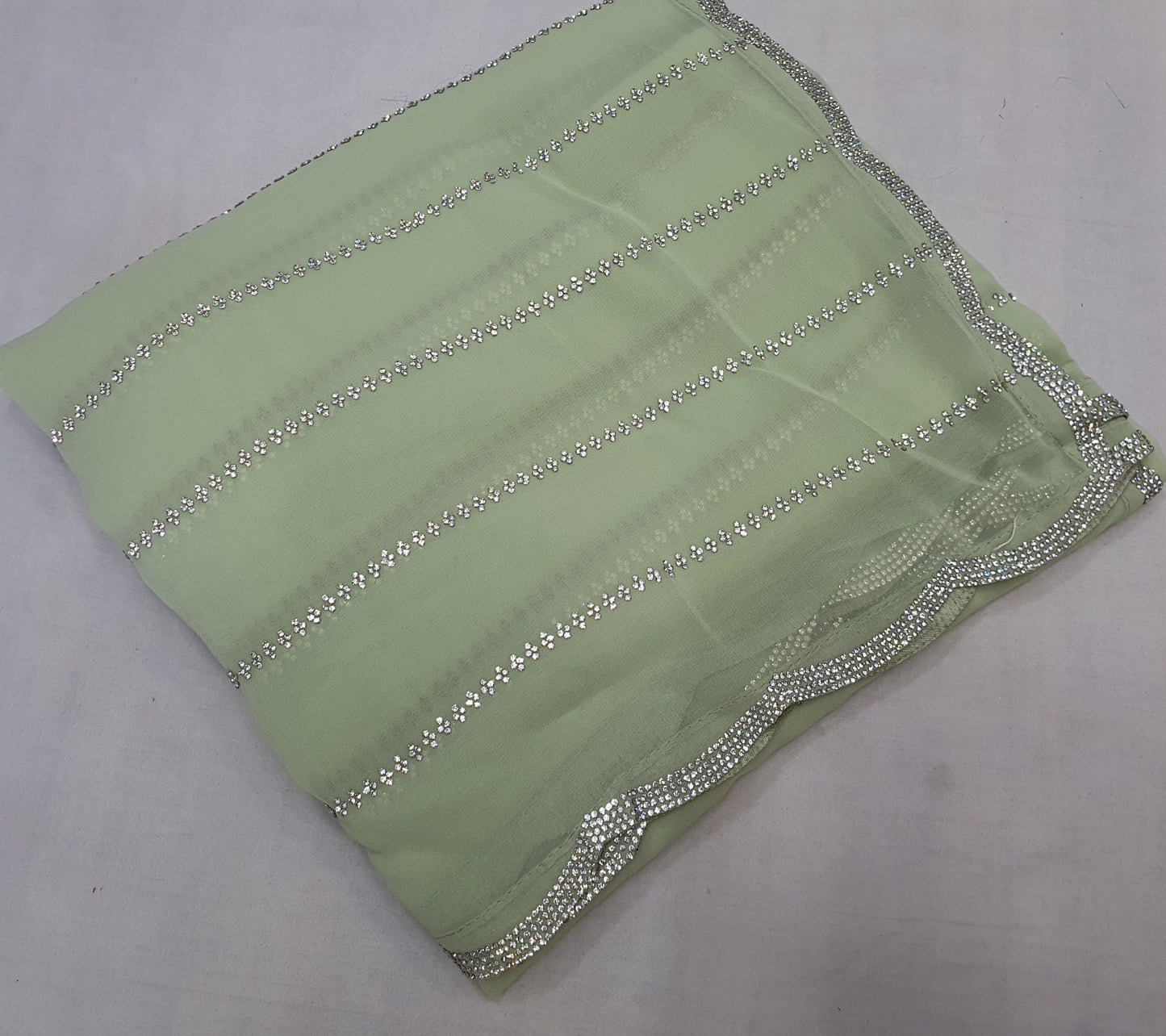 ALLOVER JARKAN STONE WORK AND BORDER ON PURE GEORGETTE*saree