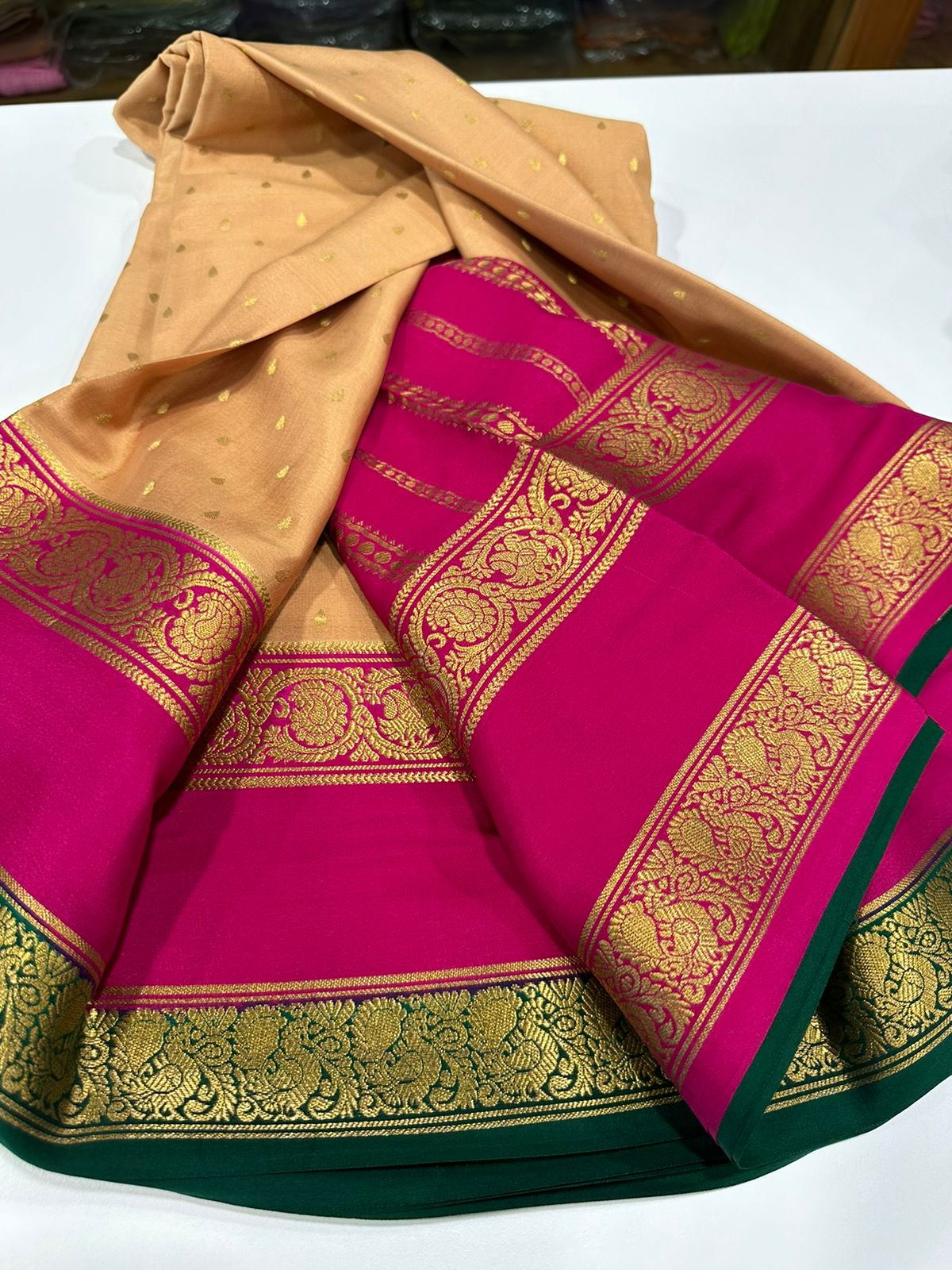 Pure Mysore silk sarees
120 grm thickness  with rich pallu 
Silk mark certified
Big mango n peacock design on border