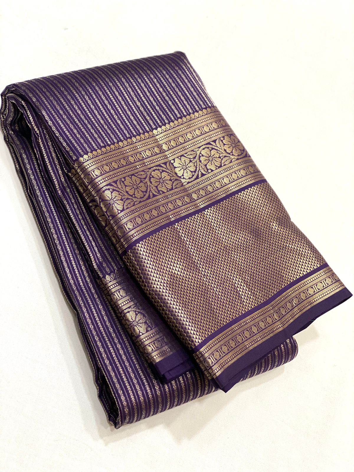 Pure Kanchivaram handloom silk saree with pure 2g zari traditional long border strip butta all over saree 
Silkmark certified