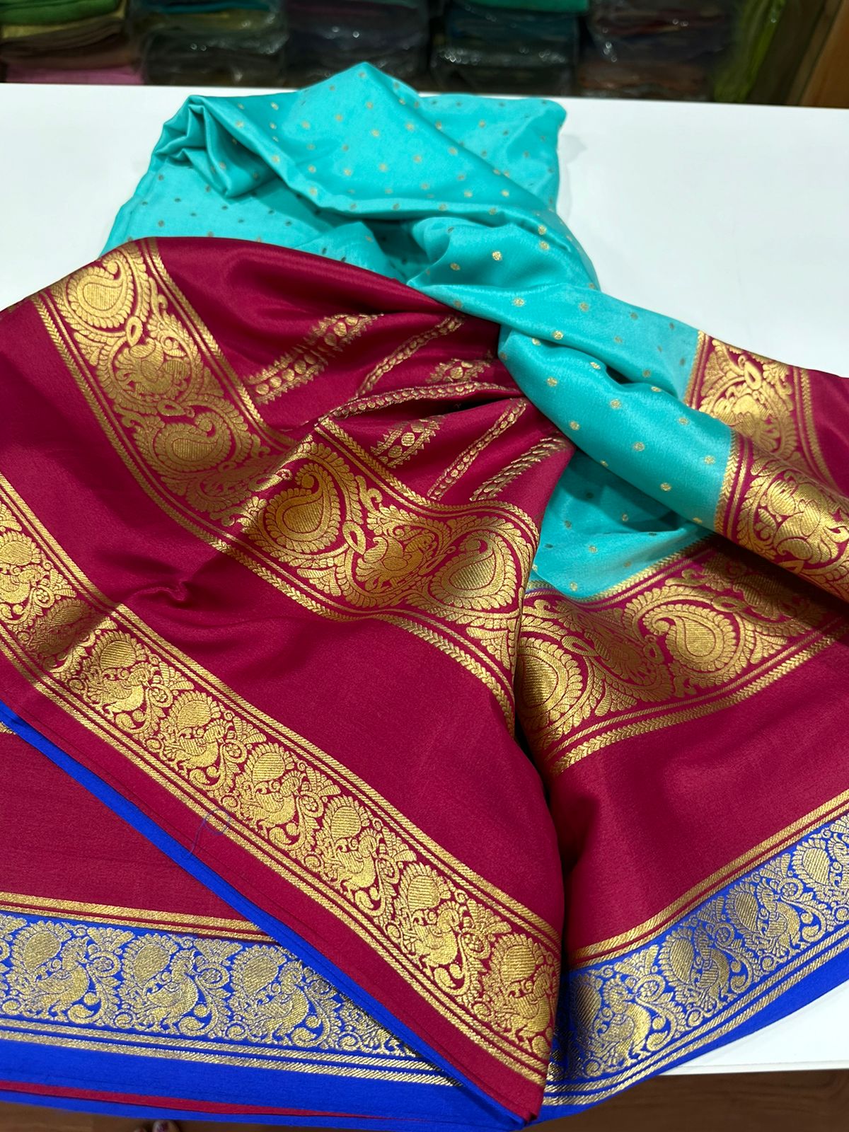Pure Mysore silk sarees
120 grm thickness  with rich pallu 
Silk mark certified
Big mango n peacock design on border
