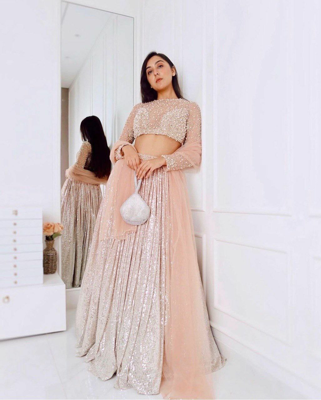 Party wear lehenga collection satin silk padding lehnga with sequence work 
Flair 3 meter
Can can attach
 Net blouse with Pearl , sequnece & zari work all over front & back ( Unstich )
Net Duppata with Pearl border work