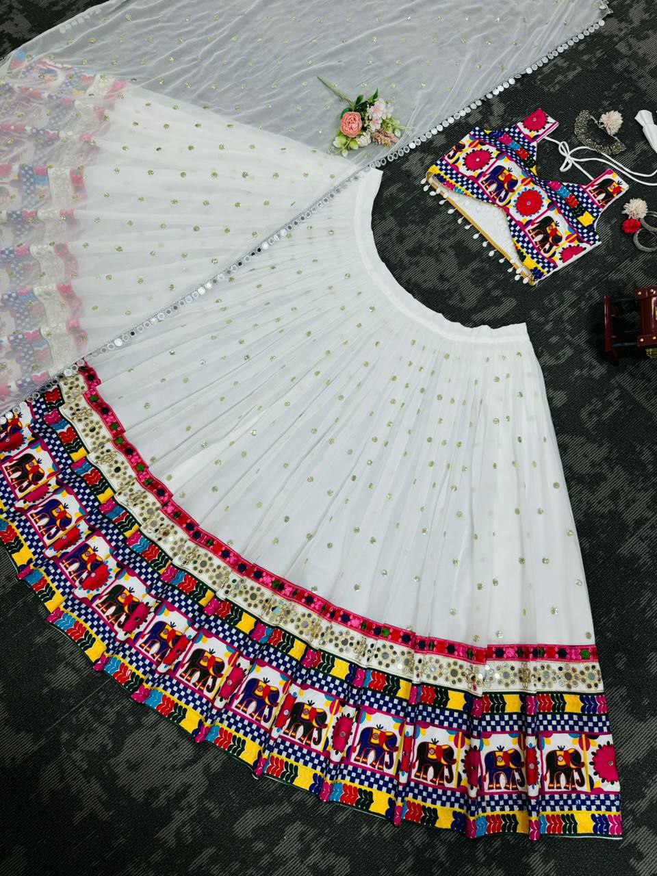 Perfect ring ceremony lehenga choli set :                                   Foux gorgette 
Work : Sequnce with Chainstich work with *Real mirror
