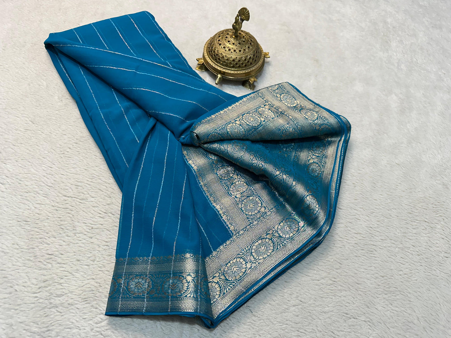 Designer Chiffon Sarees Beautiful Chiffon sarees having Elegant deco vertical stripes with rich pallu in elegant shades