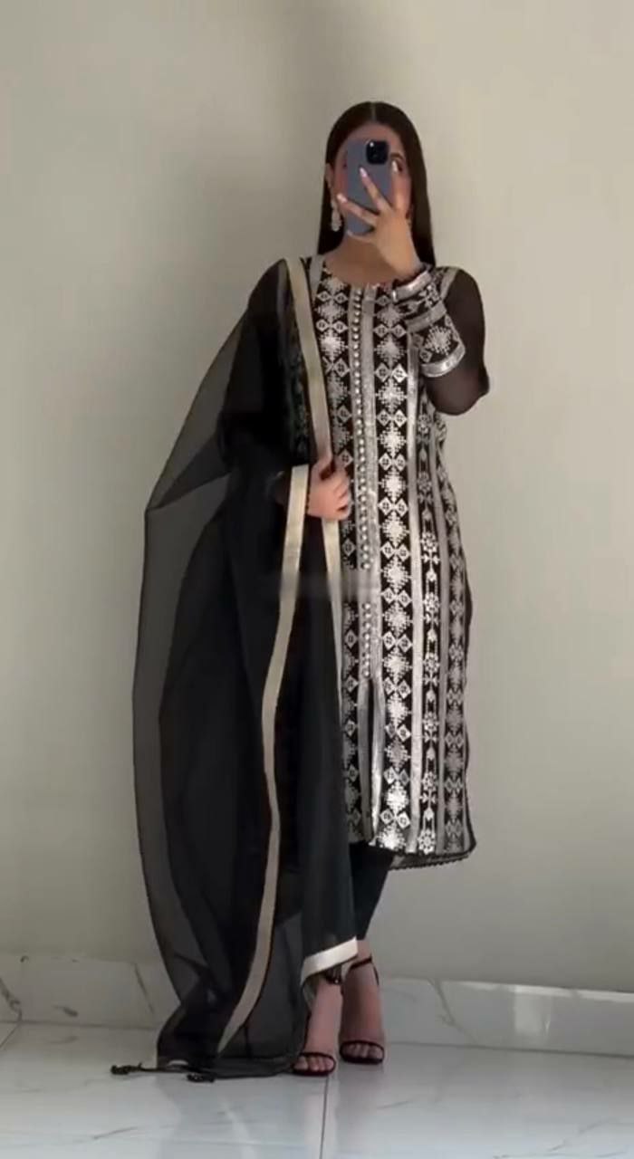Designer suit set
FABRICE:-Heavy faux georgette 
WORK - Fancy Embroidery 5mmSequence Work with fancy GPO lace border 
SLEEVE :- Full Sleeve With embroidery 5mm sequence Work with fancy GPO lace border 
INNER :- Micro Cotton